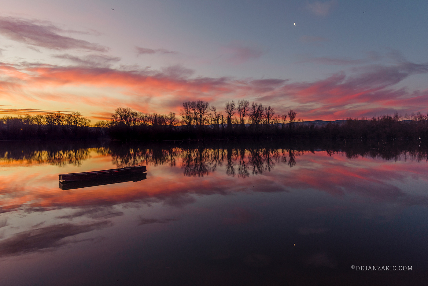 Photograph of sunrise & sunset and water by Dejan Zakić
